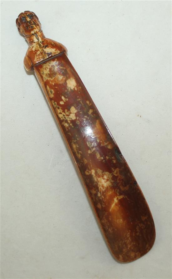 An early 19th century ivory shoe horn, 6.25in.